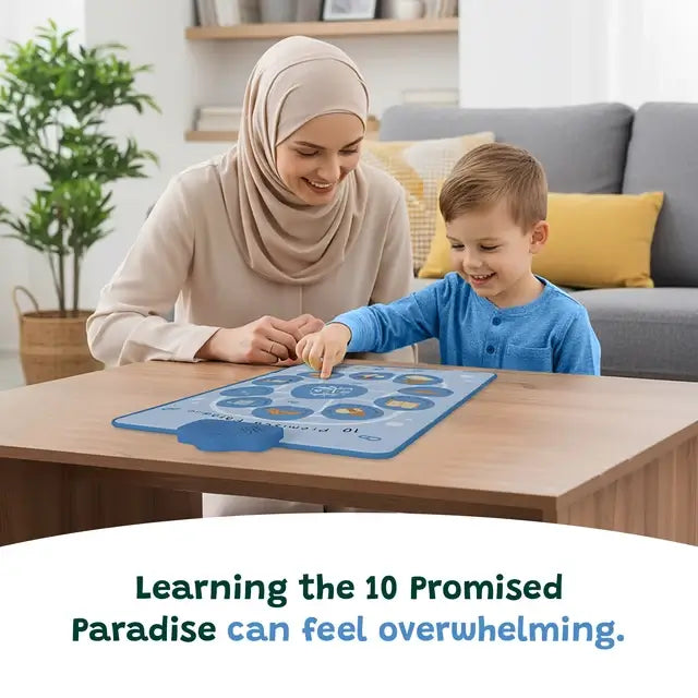 Woman in a hijab and a boy touching the 10 Promised Paradise interactive wall art laid flat on a wooden table