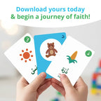 Hands holding three illustrated Arabic Words flash cards: a sun, a teddy bear and corn