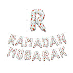 White watermelon-print foil balloons spelling Ramadan Mubarak, with a single letter R shown above
