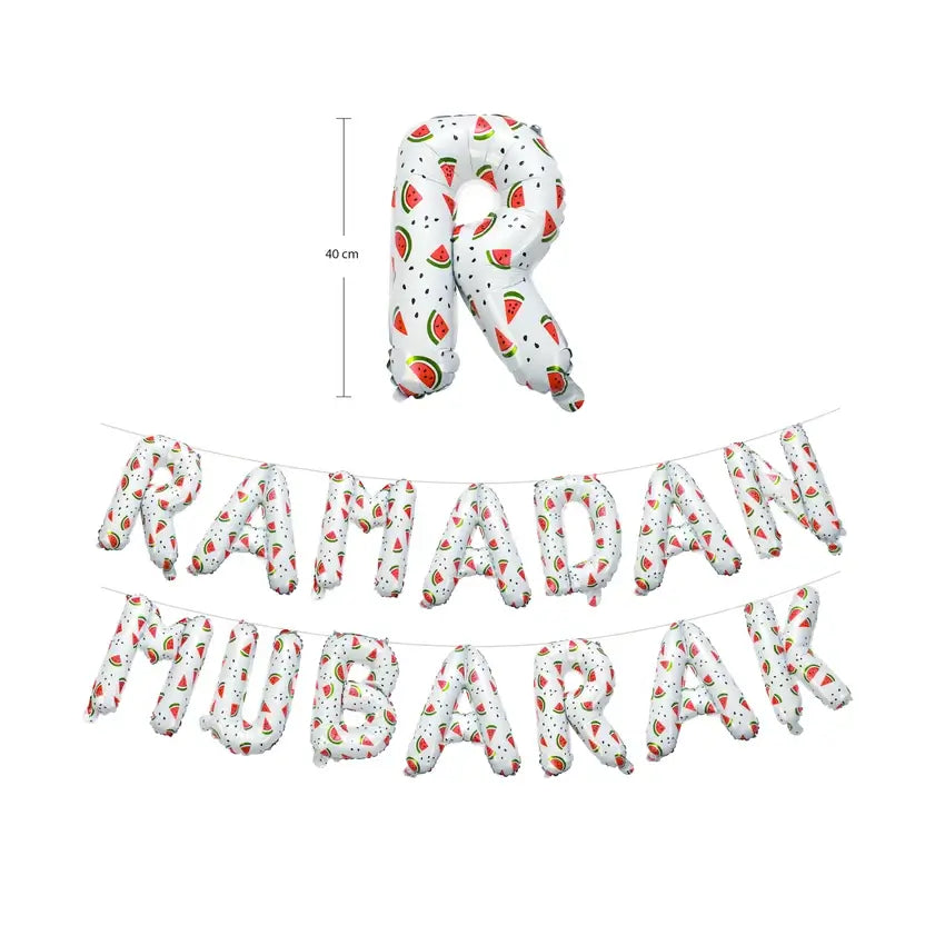White watermelon-print foil balloons spelling Ramadan Mubarak, with a single letter R shown above