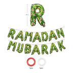 Green Ramadan Mubarak foil letter balloons strung on cord, with red and white balloon strap rolls