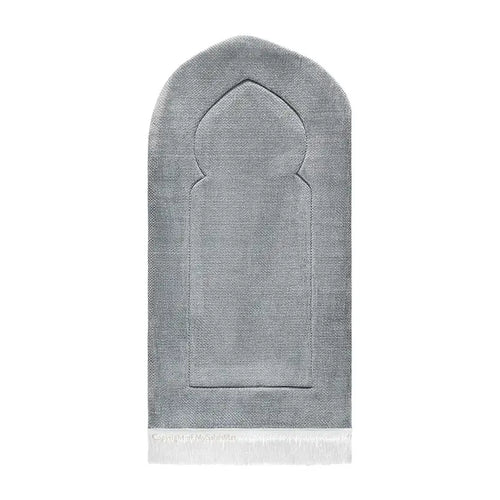 Light grey arch-shaped adult padded prayer mat with a pointed mihrab outline and white tassels