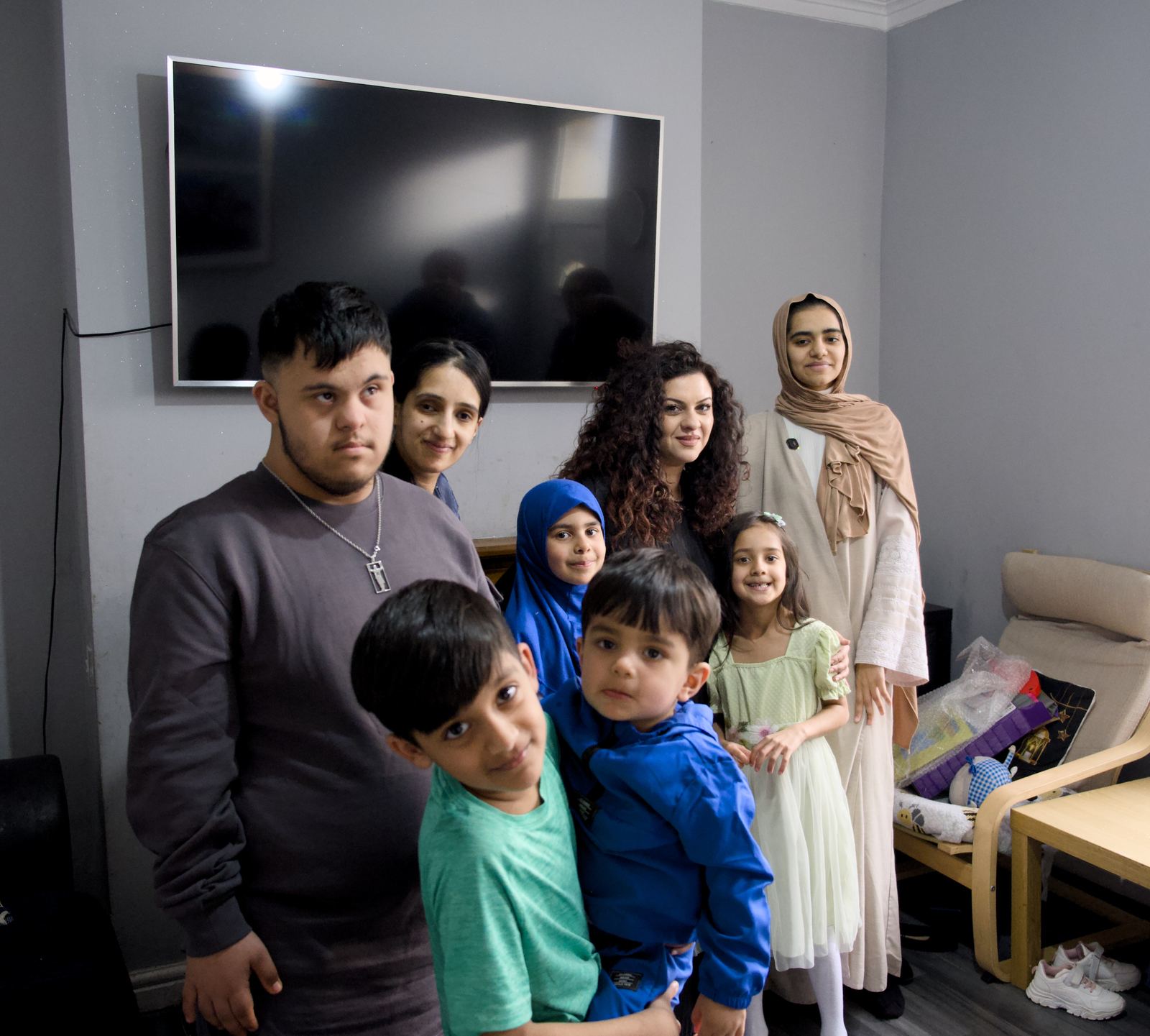 Shabs, Eisa and a family with their children