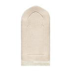 Luxury Sand Arched padded prayer mat from the front, cream woven fabric with an arch outline and white tassels