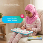 Girl in a pink hijab sitting on a sofa with My Quran Pad on her lap